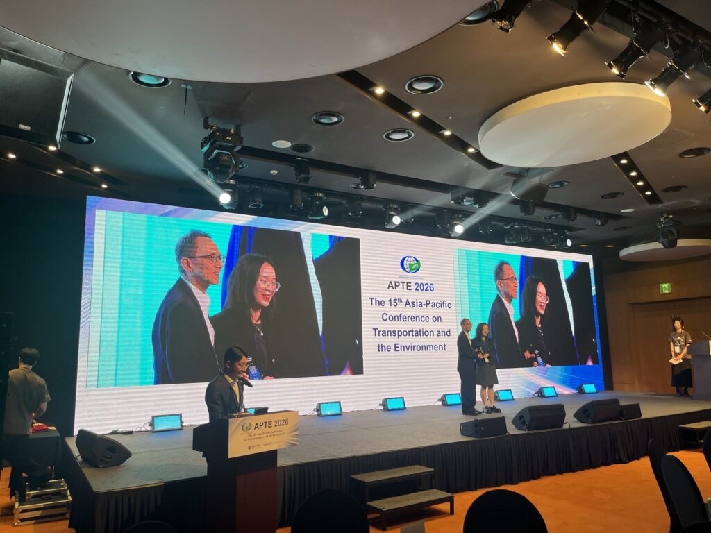 Award recognition on stage at the APTE 2026 closing banquet