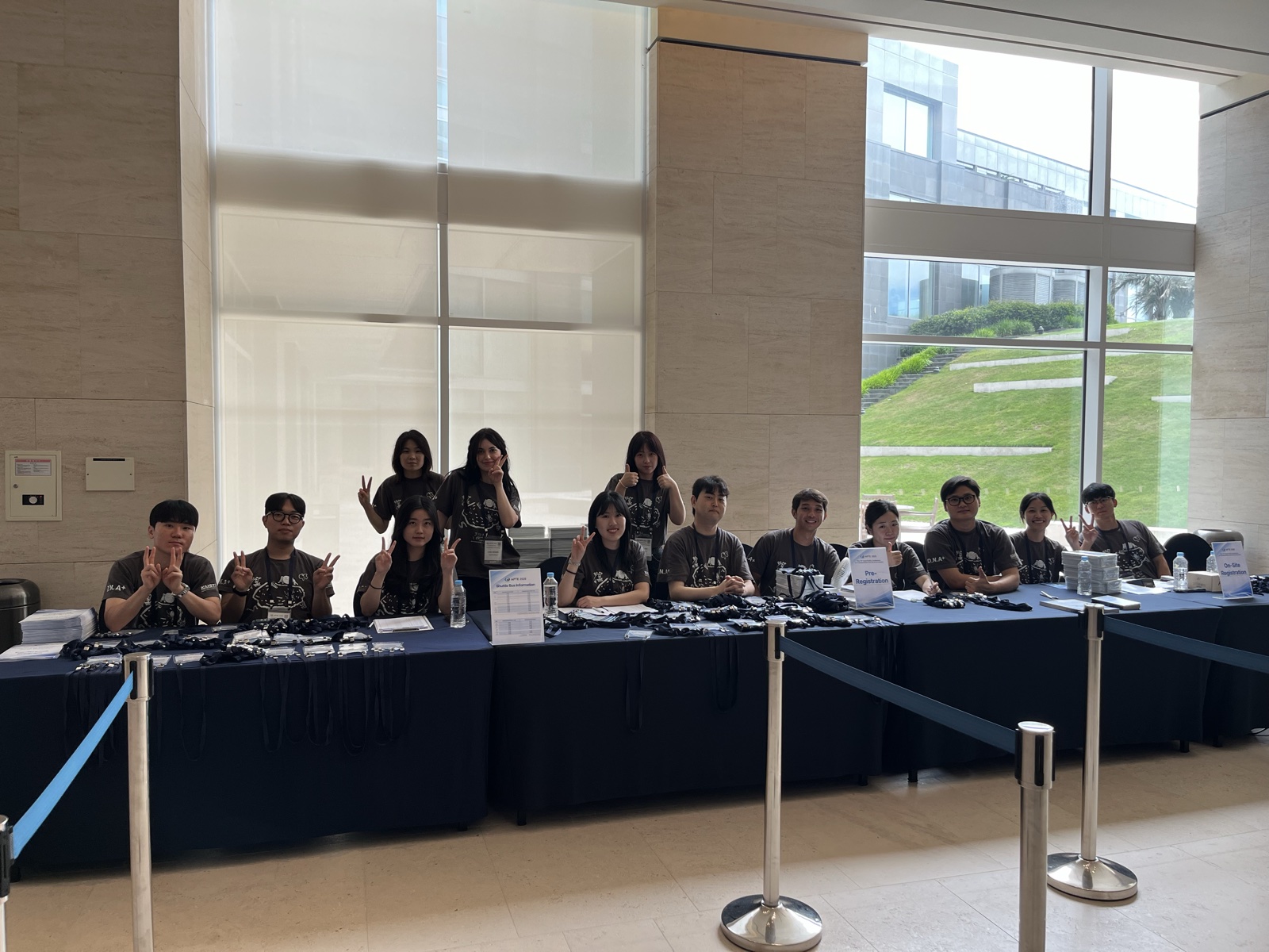 KMG student volunteers at the APTE 2026 registration desk