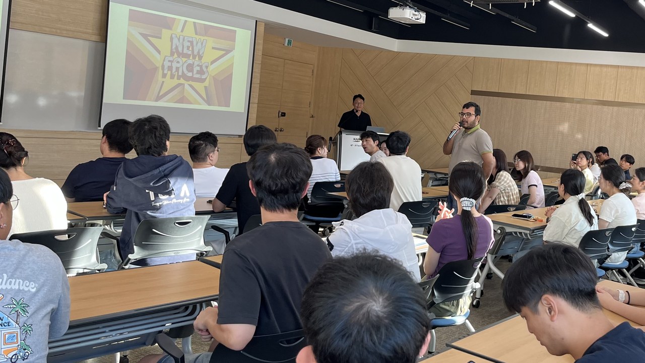 IMPACTs fall semester kick-off: a new member introduces themselves beside the NEW FACES slide at KAIST